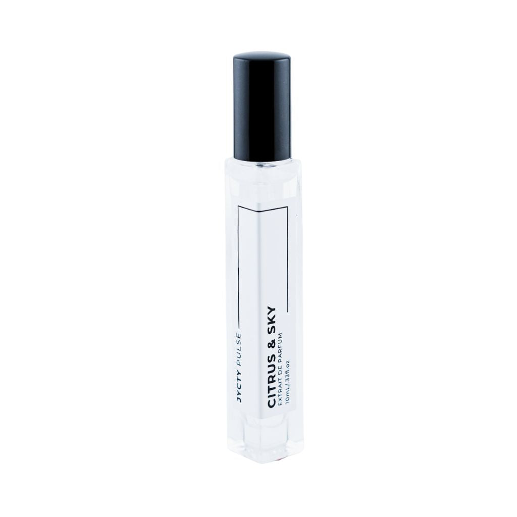 Perfume bottle with black cap on a white background