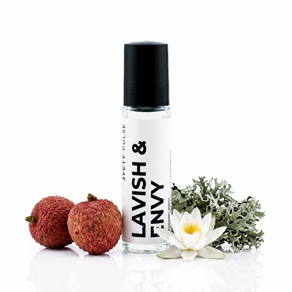 A clear cylindrical roller bottle with a black cap stands on a white reflective surface. The bottle label reads 'LAVISH & ENVY' and 'JCYT PULSE'.