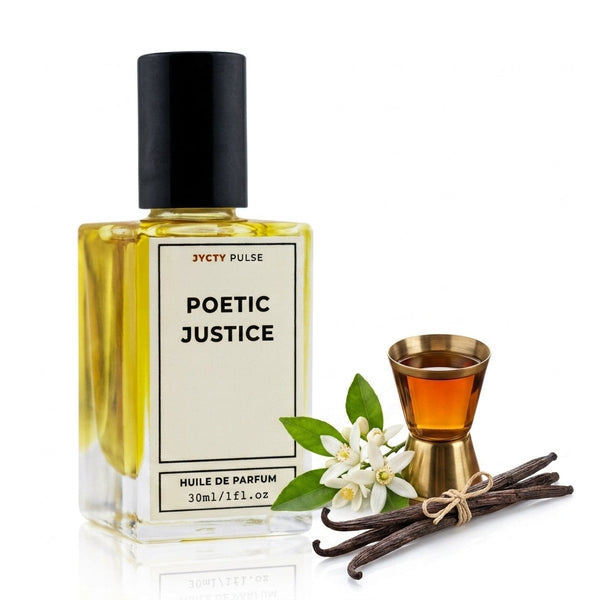 A bottle of JYCTY PULSE Poetic Justice PERUME OIL with a black cap and cream label, shown next to a small gold measuring cup, vanilla beans, and white flowers on a white background.