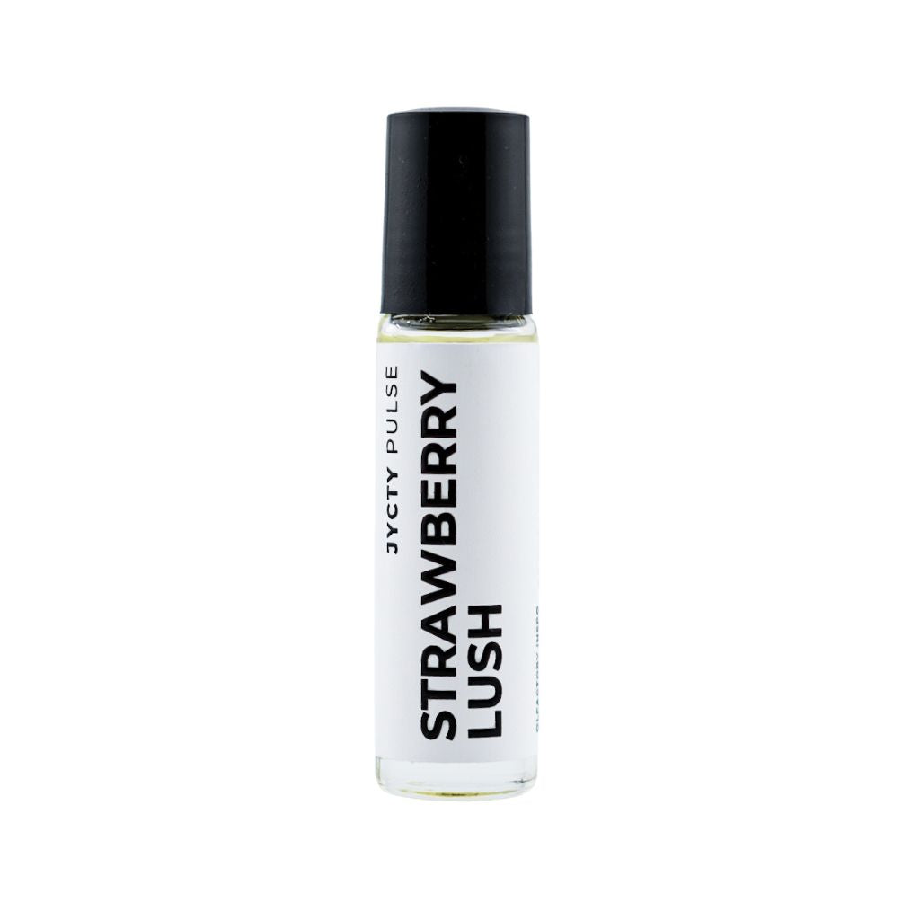 Roll-on perfume oil bottle of 'Strawberry Lush' perfume by JYCTY Pulse on a white background