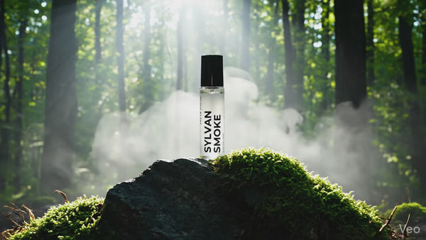 video of long lasting perfume oil Sylvan Smoke. with smoke around and in the sunlit forest