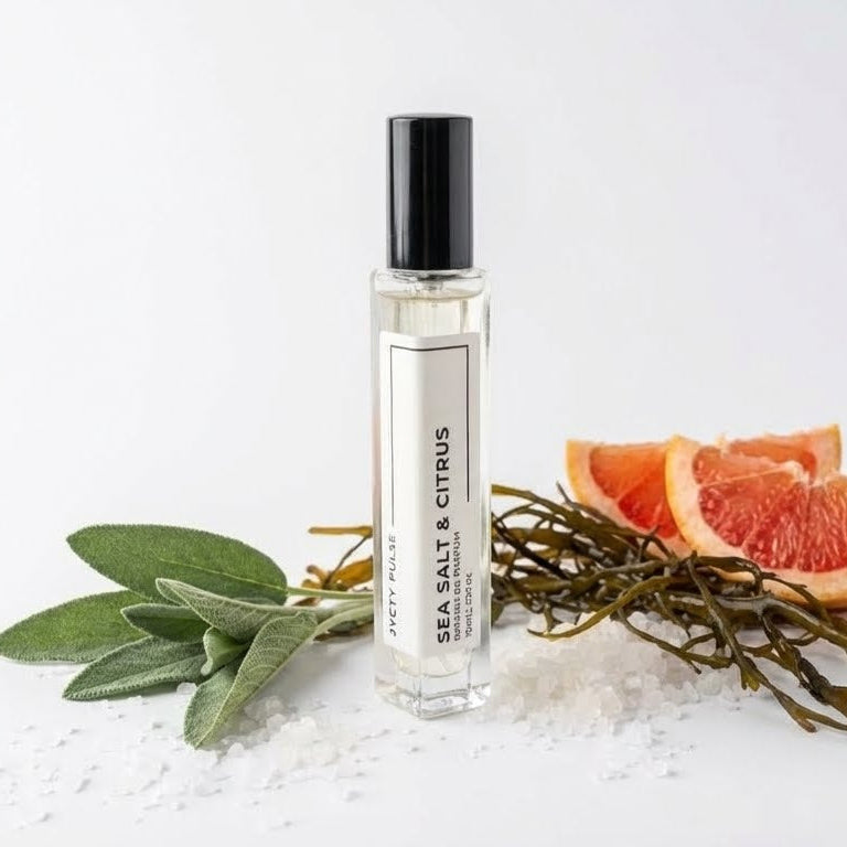 10 ml Perfume bottle labeled 'Sea Salt & Citrus' with grapefruit slices and seaweed on a white background